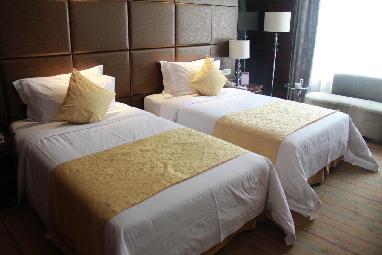 Huangjingang Holiday Hotel Jiexiu Room photo